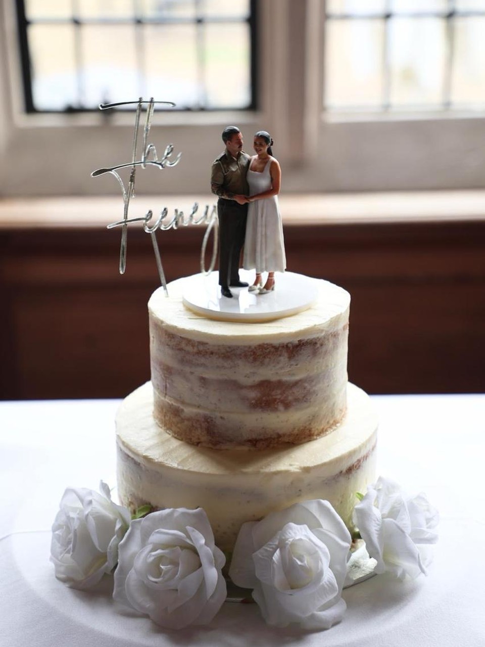 Wedding cake with 3D printed figurine cake topper